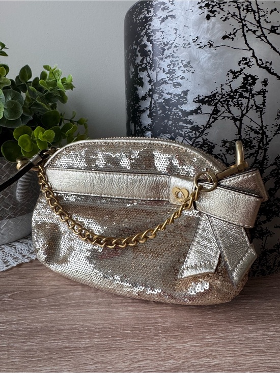 Coach Handbags - Coach Gold Sequin Wristlet with Decorative Bow and Chain